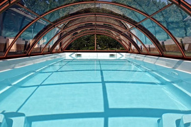 Toronto model,  retractable pool enclosure by Abri Design Cover