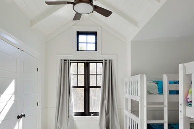 Example of a mid-sized farmhouse gender-neutral dark wood floor kids' bedroom design in Toronto with white walls