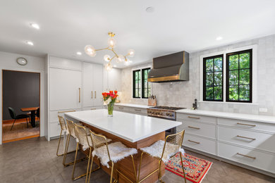Enclosed kitchen - mid-sized transitional u-shaped ceramic tile and gray floor enclosed kitchen idea in Portland with a farmhouse sink, recessed-panel cabinets, beige cabinets, quartz countertops, multicolored backsplash, ceramic backsplash, paneled appliances, an island and white countertops