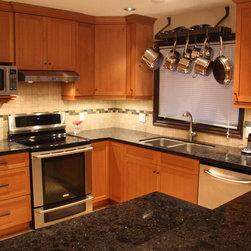 Warm and Inviting RIft Oak Spice - Kitchen Cabinetry
