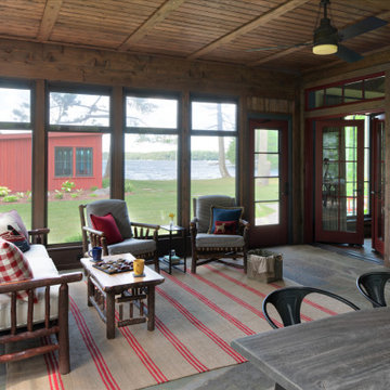 Reclaimed Wood Paneling in a Rustic Lake Cottage Screened Porch