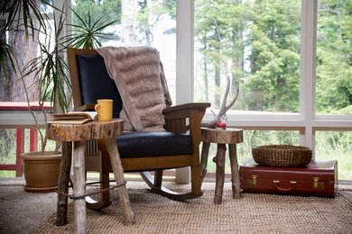 Inspiration for a rustic carpeted living room remodel in Other