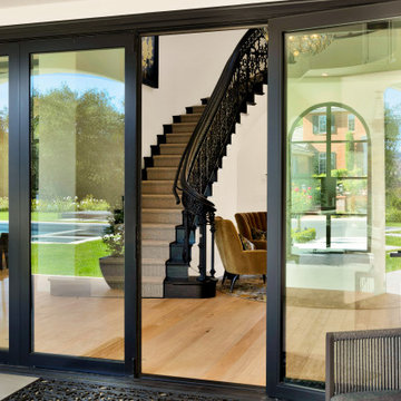 Bi-Fold Doors with Practical Man Door for Easy Entry