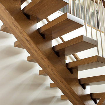 white oak mono stringer with stainless steel spindles