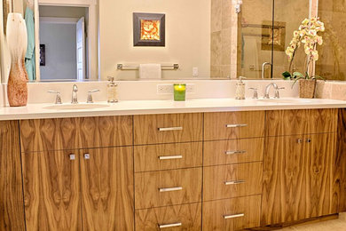Bathroom - mid-sized transitional bathroom idea in Seattle with flat-panel cabinets, medium tone wood cabinets, beige walls, an undermount sink and quartz countertops