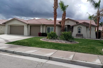 Example of a tuscan exterior home design in Other