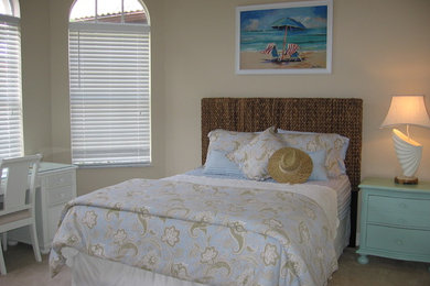 Example of a beach style bedroom design in Miami