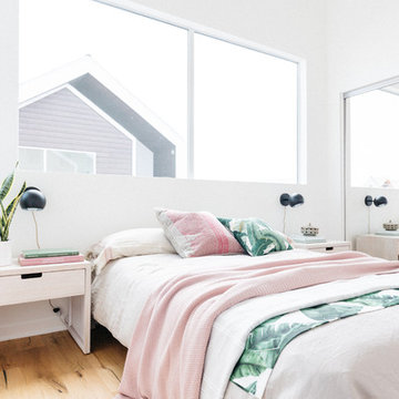 Black Gumball Sconces in Millennial Pink and Palm Leaf Green Bedroom
