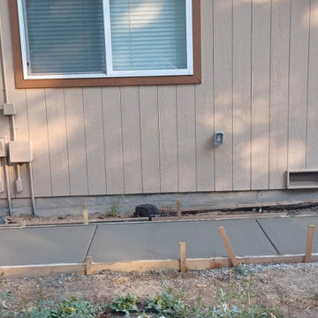 Concrete Walkways and Green House