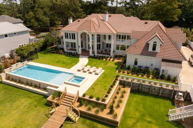 Example of a beach style pool design in Other