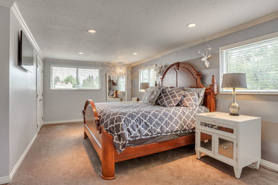 Example of a small transitional master carpeted and beige floor bedroom design in Salt Lake City with gray walls