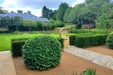 Contemporary garden in Cheshire with natural stone pavers.