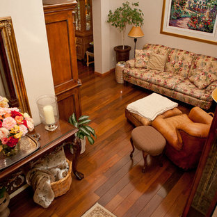 Example of a transitional home design design in Denver