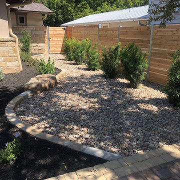 Combination of mulch and Colorado River Rock with "future" privacy shrubs