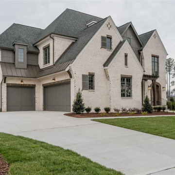 Elegant 5-Bedroom Tudor House Plan with Open Layout - San Antonio, TX