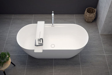 Immagine di una stanza da bagno padronale minimalista di medie dimensioni con ante bianche, vasca freestanding e mobile bagno freestanding