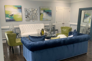 Inspiration for a mid-sized contemporary formal and open concept dark wood floor, brown floor and wainscoting living room remodel in DC Metro with gray walls, no fireplace and no tv
