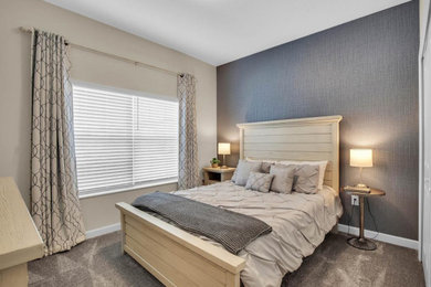 Example of a mid-sized trendy guest wallpaper bedroom design