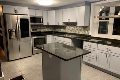 Example of a transitional kitchen design in Boston