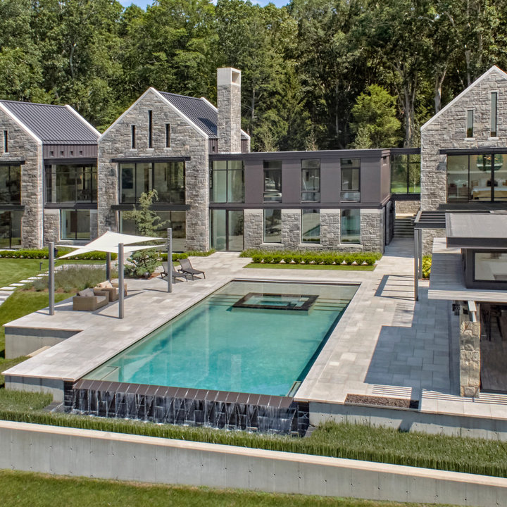 Picture of 75 Beautiful Exterior with Stone Veneer Ideas & Designs - February 2026 ...