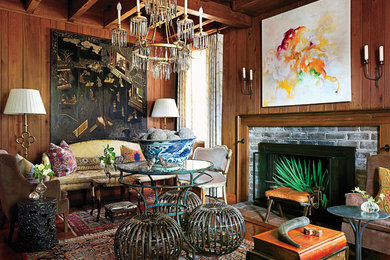 Example of a classic living room design in Birmingham with a brick fireplace