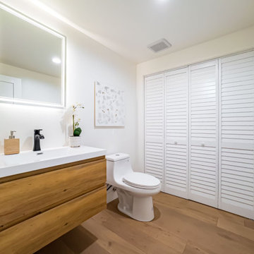 Oak Vanity Bath with Backlit Mirror and Louvered Storage