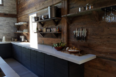 Example of a country kitchen design in Other
