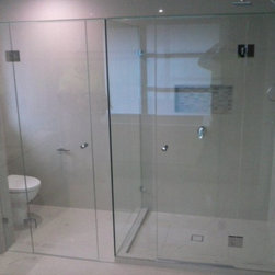 Frameless Shower Screens - Shower Heads and Body Sprays