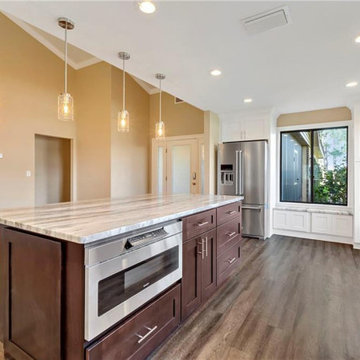 Kitchen Cabinets, Granite, Luxury Vinyl Plank Flooring