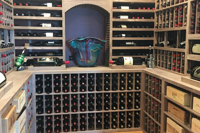 Example of a classic wine cellar design in Los Angeles