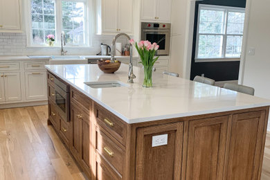 Example of a farmhouse kitchen design in New York