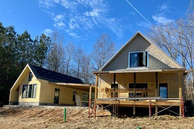 Example of a trendy home design design in Other