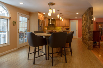 Example of a transitional home design design in Boston