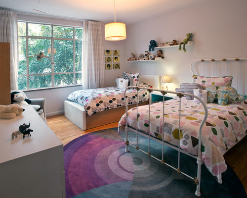 Eclectic Kids Mexico City Example of an eclectic gender-neutral kids' room design in Mexico City with white