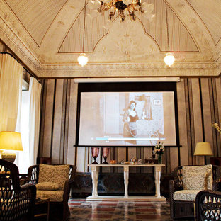 Photo of a large traditional enclosed home cinema in New York with multi-coloured walls, terracotta flooring and a projector screen.