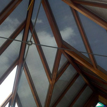 Main Line Conservatory (Fixed Solar Screens & Lutron Motorized Roller Shades)