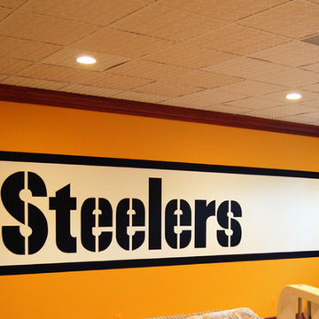 Pittsburgh Steelers 1970's Themed Locker Room Murals in a Home Gym/Game Room