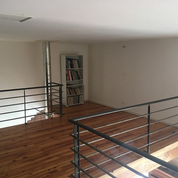 aménagement mezzanine pose de verrière et porte d'atelier