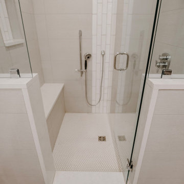 Knee wall with upper glass. Louisville Tile floor, Pennyround.