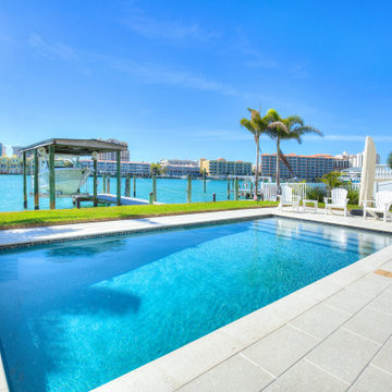 Luxury Waterfront Residence with Modern Pool and Scenic Views