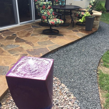 Flagstone patio, basalt and pondless water feature