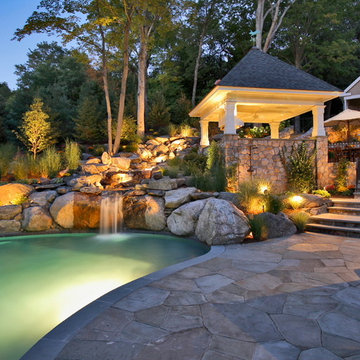 Night View of Pool and Waterfall