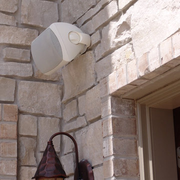 Outdoor Speaker Mount on Stone Exterior