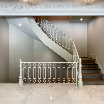 Project #104 | Curved Staircases in French Inspired Mansion