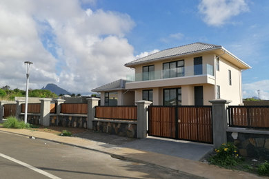 Example of a trendy home design design in Other