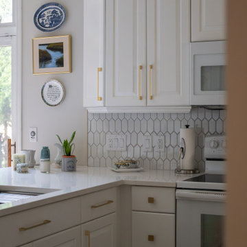 Contemporary White Kitchen Renovation with Custom Built-ins