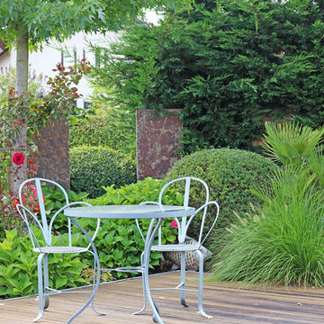 Garten mit Urlaubsflair und Koiteich