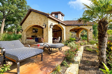 Example of a large transitional backyard concrete paver pool house design in Dallas