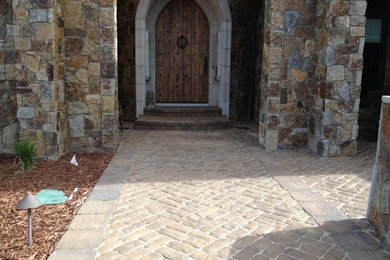 Tuscan home design photo in Denver