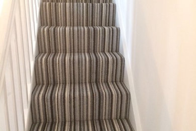 Striped carpet on stairs
